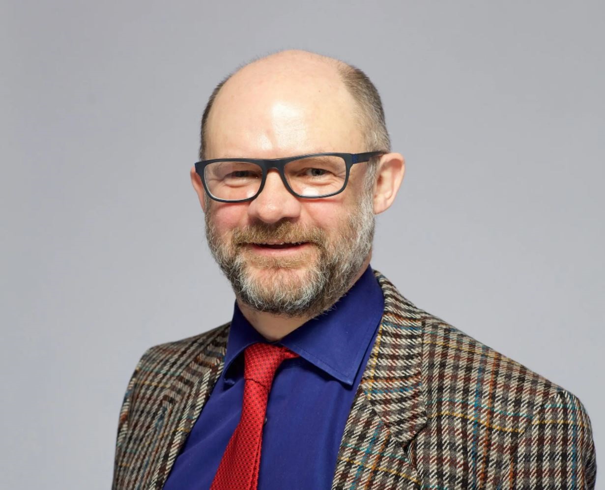Adam Sutcliffe Headshot